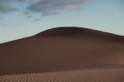 Scenic view of desert against sky