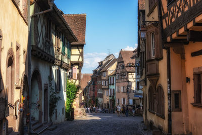 Riquewihr historical town with timbered houses along the narrow cobble stoned street in riquewihr