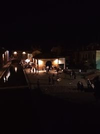 People on street at night