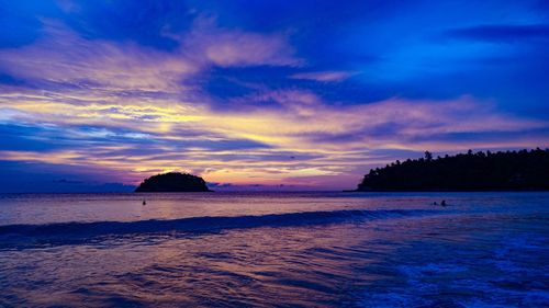 Scenic view of sea against sky at sunset