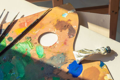 High angle view of paintbrushes on table