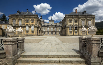 View of old building against cloudy sky