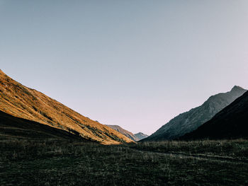 Scenic view of mountains against clear sky