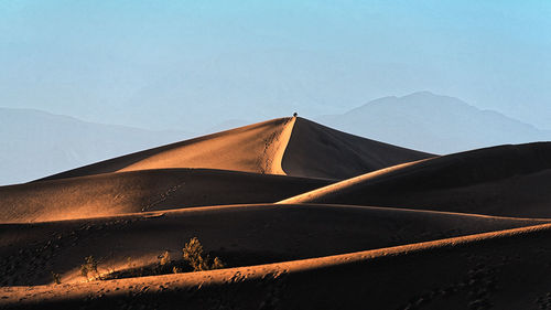 Scenic view of desert against sky