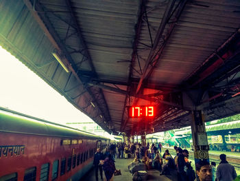 Group of people at railroad station platform