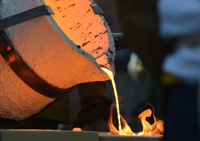 Iron pour close up with liquid metal.