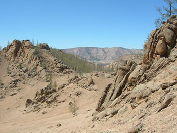 Scenic view of mountains against clear sky