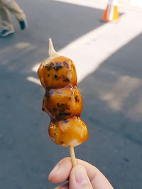 Person holding ice cream cone