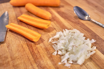 High angle view of chopped bread on cutting board