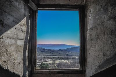 View of landscape through window