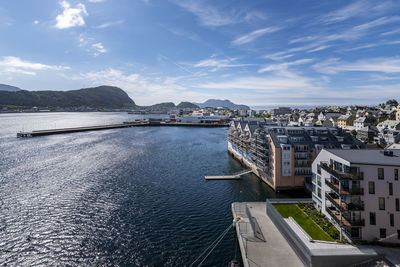 High angle view of river amidst buildings in city