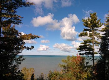 Scenic view of sea against cloudy sky