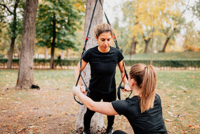 Beautiful women exercising outdoors