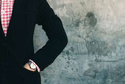 Close-up of man standing on hand