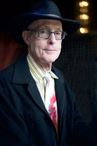 Portrait of senior man wearing hat