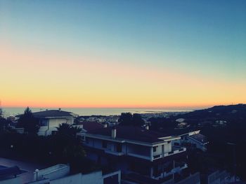 High angle view of townscape against sky during sunset