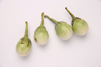 Close-up of fruits against white background