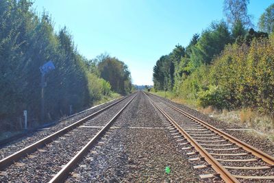 View of railroad tracks against clear sky