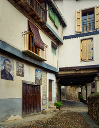 Alley amidst buildings in town