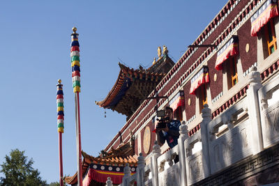 Low angle view of temple against sky