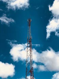 Low angle view of communications tower against sky