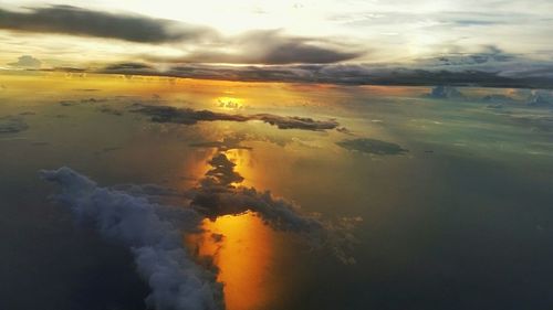 Scenic view of cloudy sky at sunset