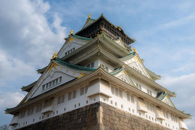 Low angle view of temple building against sky