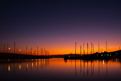 Silhouette of marina at sunset