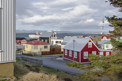 Street scene with colorful houses with roofs and facades of wood and corrugated metal