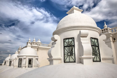 Low angle view of leon cathedral against sky