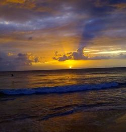 Scenic view of sea against sky during sunset