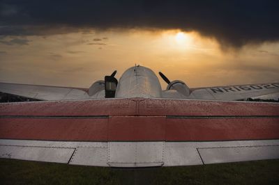 Rear view of a plane at dawn