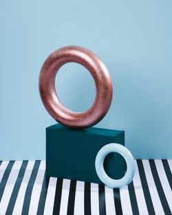 Close-up of metallic structure against blue background