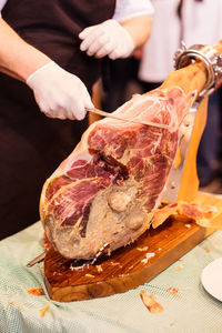 Close-up of man preparing food