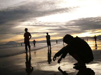 Scenic view of sea at sunset