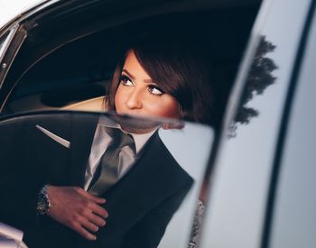 Portrait of woman in car