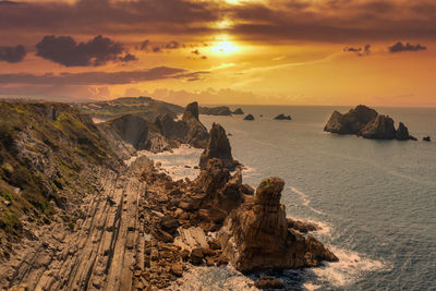 Scenic view of sea against sky during sunset