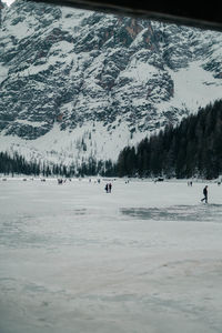 Scenic view of snowcapped mountains during winter