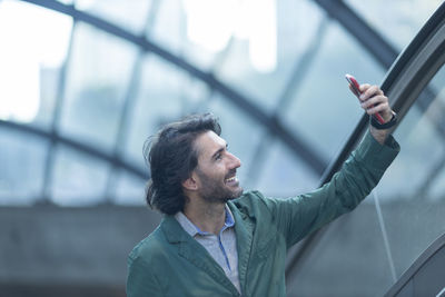 Young man using mobile phone