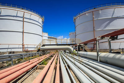 Low angle view of factory against sky