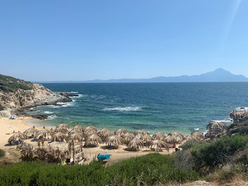 Scenic view of sea against clear blue sky