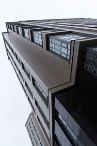 Low angle view of modern building against clear sky