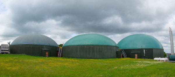 Panoramic view of factory against sky