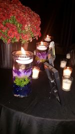 Illuminated tea light candles flowers