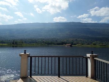 Scenic view of lake and mountain against sky