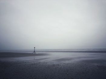 Scenic view of sea against sky during winter