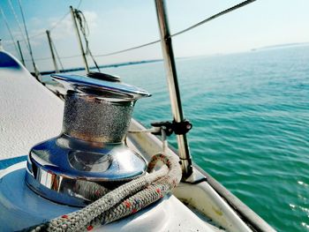 Close-up of bollard on boat in sea