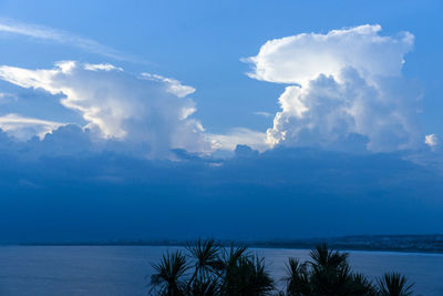 Scenic view of sea against blue sky