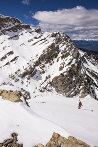 Scenic view of snow covered mountain against sky