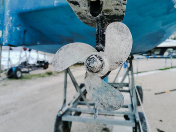 Close-up of rusty chain hanging on boat